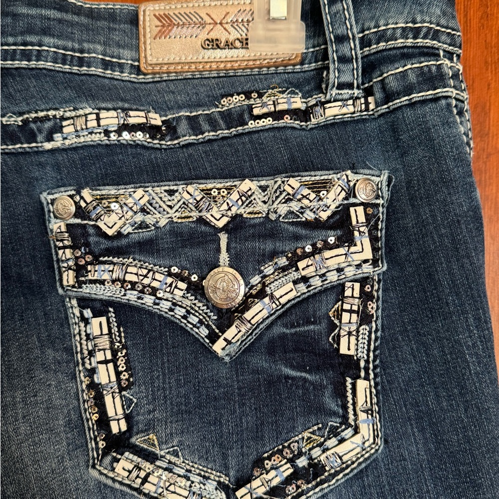Jeans , bootcut, stretchy , size 32 beautiful embroidery